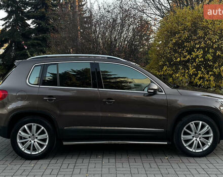 Коричневий Фольксваген Тігуан, об'ємом двигуна 2 л та пробігом 200 тис. км за 16650 $, фото 7 на Automoto.ua