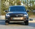 Коричневий Фольксваген Тігуан, об'ємом двигуна 2 л та пробігом 186 тис. км за 13850 $, фото 1 на Automoto.ua