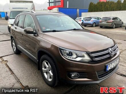 Коричневий Фольксваген Тігуан, об'ємом двигуна 2 л та пробігом 238 тис. км за 14000 $, фото 1 на Automoto.ua