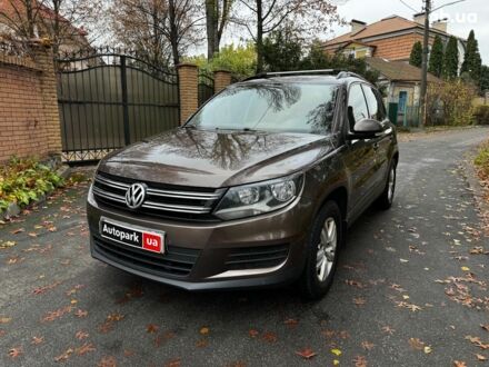 Коричневий Фольксваген Тігуан, об'ємом двигуна 2 л та пробігом 351 тис. км за 13490 $, фото 1 на Automoto.ua