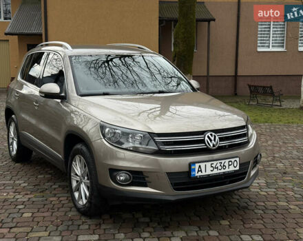 Коричневий Фольксваген Тігуан, об'ємом двигуна 2 л та пробігом 210 тис. км за 13900 $, фото 1 на Automoto.ua