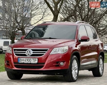Красный Фольксваген Тигуан, объемом двигателя 2 л и пробегом 244 тыс. км за 8999 $, фото 2 на Automoto.ua