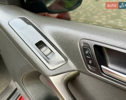 Красный Фольксваген Тигуан, объемом двигателя 2 л и пробегом 244 тыс. км за 8999 $, фото 44 на Automoto.ua