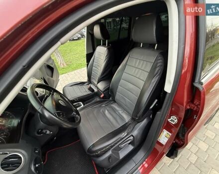 Красный Фольксваген Тигуан, объемом двигателя 2 л и пробегом 244 тыс. км за 8999 $, фото 66 на Automoto.ua