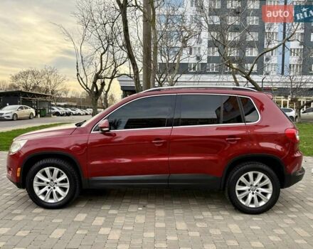 Красный Фольксваген Тигуан, объемом двигателя 2 л и пробегом 244 тыс. км за 8999 $, фото 4 на Automoto.ua