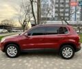 Красный Фольксваген Тигуан, объемом двигателя 2 л и пробегом 244 тыс. км за 8999 $, фото 4 на Automoto.ua