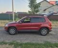 Червоний Фольксваген Тігуан, об'ємом двигуна 2 л та пробігом 212 тис. км за 6999 $, фото 22 на Automoto.ua