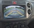 Червоний Фольксваген Тігуан, об'ємом двигуна 2 л та пробігом 212 тис. км за 6999 $, фото 1 на Automoto.ua