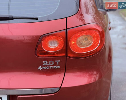 Червоний Фольксваген Тігуан, об'ємом двигуна 1.98 л та пробігом 218 тис. км за 8999 $, фото 27 на Automoto.ua