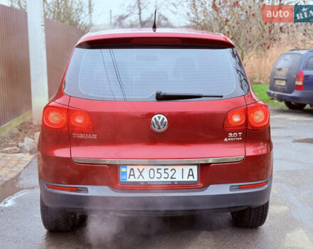 Червоний Фольксваген Тігуан, об'ємом двигуна 1.98 л та пробігом 218 тис. км за 8999 $, фото 26 на Automoto.ua