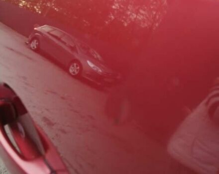 Красный Фольксваген Тигуан, объемом двигателя 2 л и пробегом 173 тыс. км за 12200 $, фото 6 на Automoto.ua