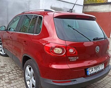 Красный Фольксваген Тигуан, объемом двигателя 1.98 л и пробегом 270 тыс. км за 9000 $, фото 3 на Automoto.ua