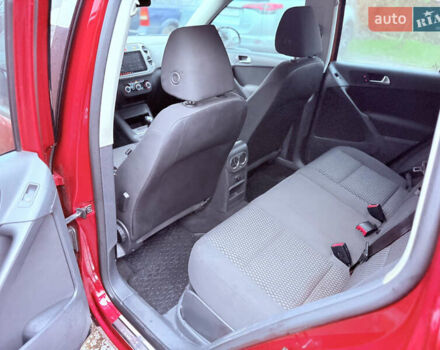 Червоний Фольксваген Тігуан, об'ємом двигуна 1.98 л та пробігом 218 тис. км за 8999 $, фото 21 на Automoto.ua