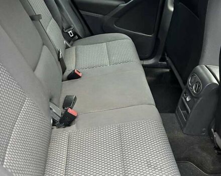 Красный Фольксваген Тигуан, объемом двигателя 1.98 л и пробегом 215 тыс. км за 10500 $, фото 8 на Automoto.ua