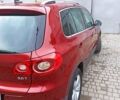 Красный Фольксваген Тигуан, объемом двигателя 1.98 л и пробегом 270 тыс. км за 9000 $, фото 1 на Automoto.ua
