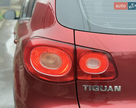 Червоний Фольксваген Тігуан, об'ємом двигуна 1.98 л та пробігом 218 тис. км за 8999 $, фото 30 на Automoto.ua
