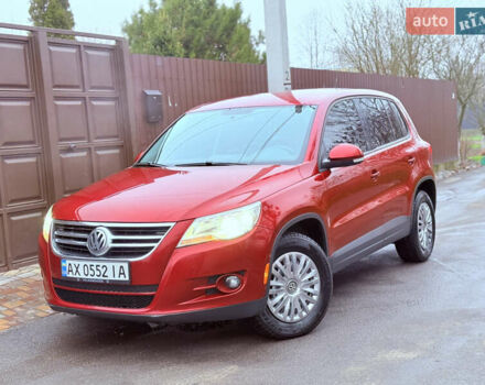 Червоний Фольксваген Тігуан, об'ємом двигуна 1.98 л та пробігом 218 тис. км за 8999 $, фото 1 на Automoto.ua