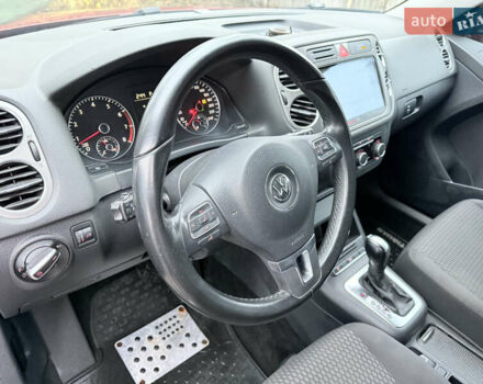 Червоний Фольксваген Тігуан, об'ємом двигуна 1.98 л та пробігом 218 тис. км за 8999 $, фото 47 на Automoto.ua