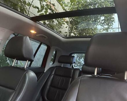 Красный Фольксваген Тигуан, объемом двигателя 2 л и пробегом 238 тыс. км за 12000 $, фото 2 на Automoto.ua