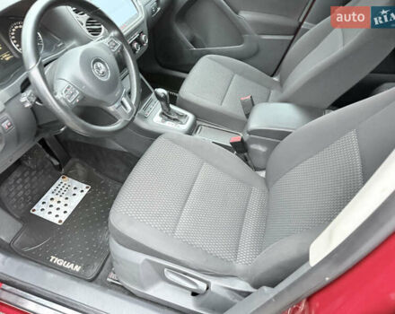 Червоний Фольксваген Тігуан, об'ємом двигуна 1.98 л та пробігом 218 тис. км за 8999 $, фото 37 на Automoto.ua