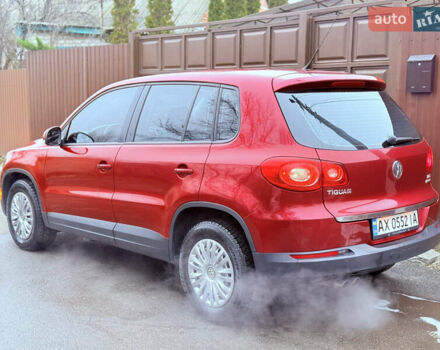 Червоний Фольксваген Тігуан, об'ємом двигуна 1.98 л та пробігом 218 тис. км за 8999 $, фото 8 на Automoto.ua