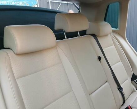 Красный Фольксваген Тигуан, объемом двигателя 2 л и пробегом 173 тыс. км за 12200 $, фото 14 на Automoto.ua