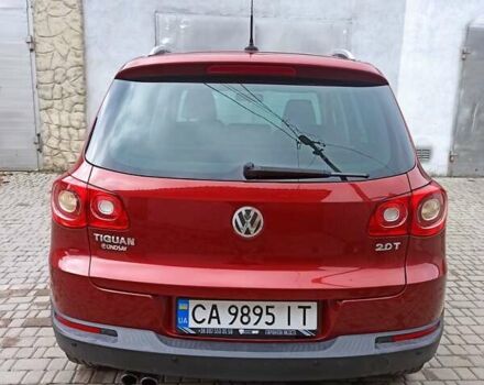 Красный Фольксваген Тигуан, объемом двигателя 1.98 л и пробегом 270 тыс. км за 9000 $, фото 6 на Automoto.ua
