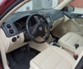 Красный Фольксваген Тигуан, объемом двигателя 1.98 л и пробегом 270 тыс. км за 9000 $, фото 15 на Automoto.ua