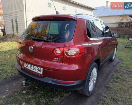 Красный Фольксваген Тигуан, объемом двигателя 1.98 л и пробегом 497 тыс. км за 9000 $, фото 9 на Automoto.ua