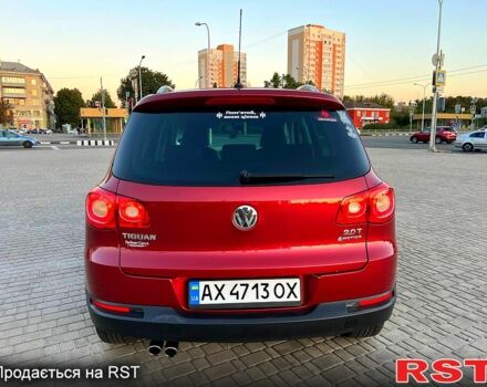 Красный Фольксваген Тигуан, объемом двигателя 2 л и пробегом 205 тыс. км за 13800 $, фото 5 на Automoto.ua