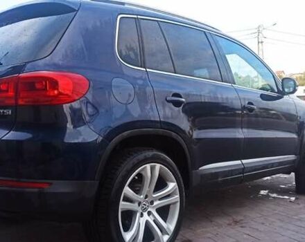 Червоний Фольксваген Тігуан, об'ємом двигуна 1.98 л та пробігом 182 тис. км за 12000 $, фото 2 на Automoto.ua