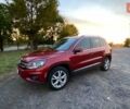 Красный Фольксваген Тигуан, объемом двигателя 1.98 л и пробегом 265 тыс. км за 10500 $, фото 1 на Automoto.ua