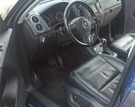 Червоний Фольксваген Тігуан, об'ємом двигуна 1.98 л та пробігом 182 тис. км за 12000 $, фото 10 на Automoto.ua