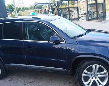 Червоний Фольксваген Тігуан, об'ємом двигуна 1.98 л та пробігом 182 тис. км за 12000 $, фото 3 на Automoto.ua