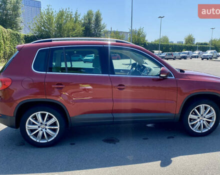Красный Фольксваген Тигуан, объемом двигателя 1.98 л и пробегом 270 тыс. км за 10800 $, фото 4 на Automoto.ua