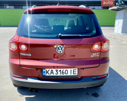 Красный Фольксваген Тигуан, объемом двигателя 1.98 л и пробегом 270 тыс. км за 10800 $, фото 3 на Automoto.ua