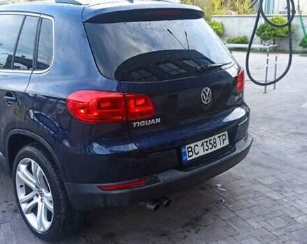 Червоний Фольксваген Тігуан, об'ємом двигуна 1.98 л та пробігом 182 тис. км за 12000 $, фото 9 на Automoto.ua