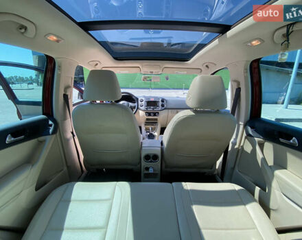 Красный Фольксваген Тигуан, объемом двигателя 1.98 л и пробегом 270 тыс. км за 10800 $, фото 8 на Automoto.ua