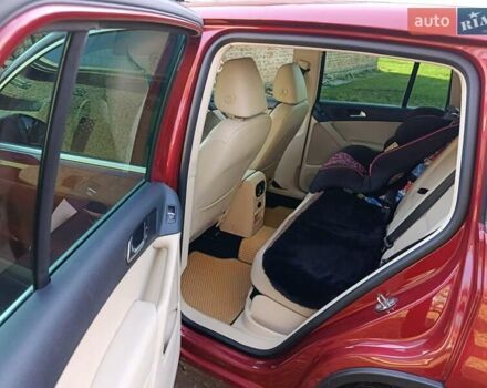 Красный Фольксваген Тигуан, объемом двигателя 1.98 л и пробегом 497 тыс. км за 9000 $, фото 10 на Automoto.ua