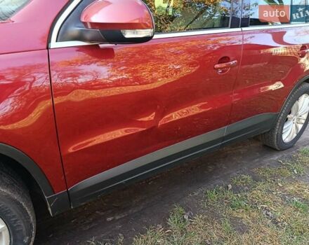 Красный Фольксваген Тигуан, объемом двигателя 1.98 л и пробегом 497 тыс. км за 9000 $, фото 14 на Automoto.ua