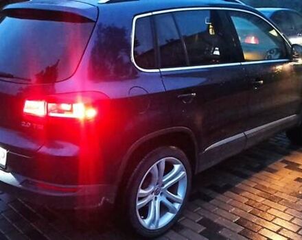 Червоний Фольксваген Тігуан, об'ємом двигуна 1.98 л та пробігом 182 тис. км за 12000 $, фото 19 на Automoto.ua