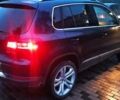 Червоний Фольксваген Тігуан, об'ємом двигуна 1.98 л та пробігом 182 тис. км за 12000 $, фото 19 на Automoto.ua