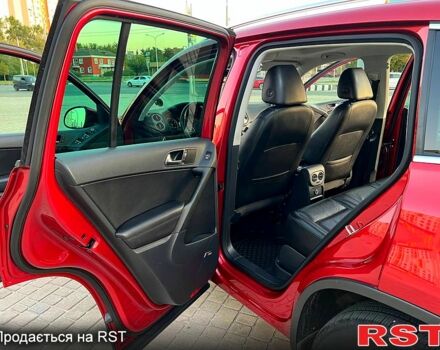 Красный Фольксваген Тигуан, объемом двигателя 2 л и пробегом 205 тыс. км за 13800 $, фото 11 на Automoto.ua