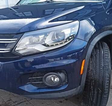 Червоний Фольксваген Тігуан, об'ємом двигуна 1.98 л та пробігом 182 тис. км за 12000 $, фото 4 на Automoto.ua