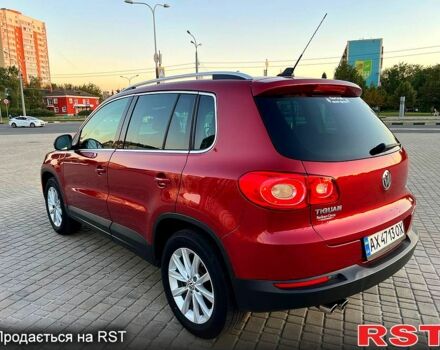 Красный Фольксваген Тигуан, объемом двигателя 2 л и пробегом 205 тыс. км за 13800 $, фото 7 на Automoto.ua