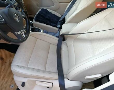 Красный Фольксваген Тигуан, объемом двигателя 1.98 л и пробегом 497 тыс. км за 9000 $, фото 3 на Automoto.ua