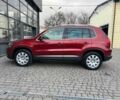Червоний Фольксваген Тігуан, об'ємом двигуна 2 л та пробігом 120 тис. км за 11800 $, фото 3 на Automoto.ua