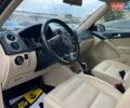 Красный Фольксваген Тигуан, объемом двигателя 1.98 л и пробегом 120 тыс. км за 11800 $, фото 10 на Automoto.ua