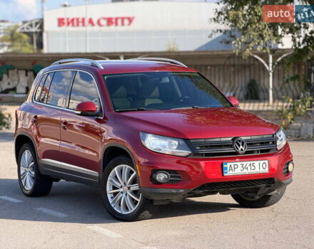 Красный Фольксваген Тигуан, объемом двигателя 1.98 л и пробегом 181 тыс. км за 12200 $, фото 1 на Automoto.ua