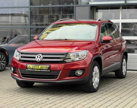 Червоний Фольксваген Тігуан, об'ємом двигуна 2 л та пробігом 120 тис. км за 11800 $, фото 2 на Automoto.ua